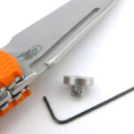 Using the 0.035" Allen key the thumb disc can be completely removed.