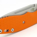 The thumb disc groove also acts like a large nail-nick giving you something to grip to open the blade.