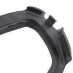 A lug on the seal clips into the side of the frame next to the hinge.