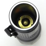 The positive contact is a long-travel sprung plate.