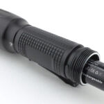 With the long-travel positive contact, when inserting a 14500 this is how far it sticks out to start with.