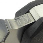 The 'TM' series marking is engraved on the blade spine.