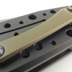 In this version, the clip and other hardware has a bronze finish.