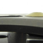 With the blade partially open the detent spring bar is pushed open.