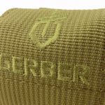 The pouch has an embroidered logo.