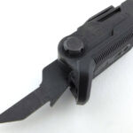 Once fully open the lock slides back forwards to lock the tool in place.
