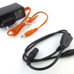 The power supply output is connected to a Y-cable to feed both power-packs at once.