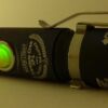 The switch has a red/green light.