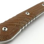 Milled micarta handles with 'shadow lines' grace the blade tang.