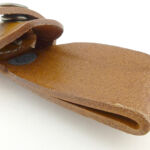 The belt loop is semi-formed round the knife handle.