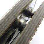 Waisted spacers give the knife an open back.