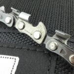 An arrow on the link indicated the cutting direction.