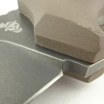 The plunge line is rounded and finishes in a sharpening choil.