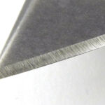 Tip detail with factory edge.