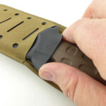 A thumb shelf makes sheath removal easy and controlled.