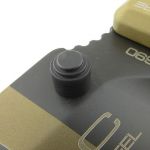 One side of the thumb-stud is plain.