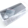 Included are a cleaning cloth and spare battery.