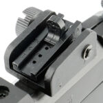 It comes with basic open sights.