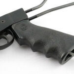 Slide it onto the rail and tighten the fixing screw.