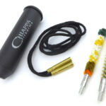 In the hollow handle is a pull-through cleaning kit with brush and mop.