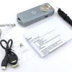 Included in the box are the instructions, a USB cable, pocket clip, and lanyard cord.