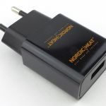 A basic USB mains charger is included.