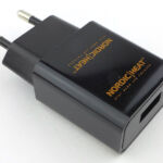 A basic USB mains charger is included.