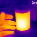 A bare hand for temperature comparison.