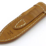 The belt loop is applied to the sheath.