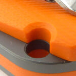 More of those details. Bevelled lanyard hole.