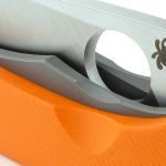 Scallops ease access to the opening hole from either side.