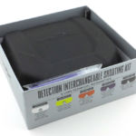 With the lid lifted off the box.