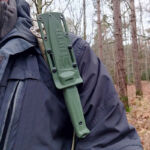 Heading out with the Sturm on a MOLLE backpack shoulder strap.