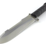 The cleaned blade no longer covered in oil.
