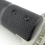 Two 'safety' screws also go through the short tang.