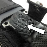 From the factory the retention strap press-studs mark the handle.