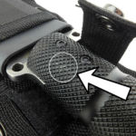 From the factory the retention strap press-studs mark the handle.