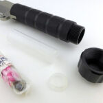Taking out the capsule contents.