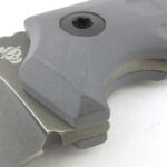 A generous finger groove / guard makes the grip very solid.