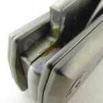 Blade tang next to back-spring/spacer.