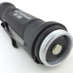 One of the two CR123 cells is visible.